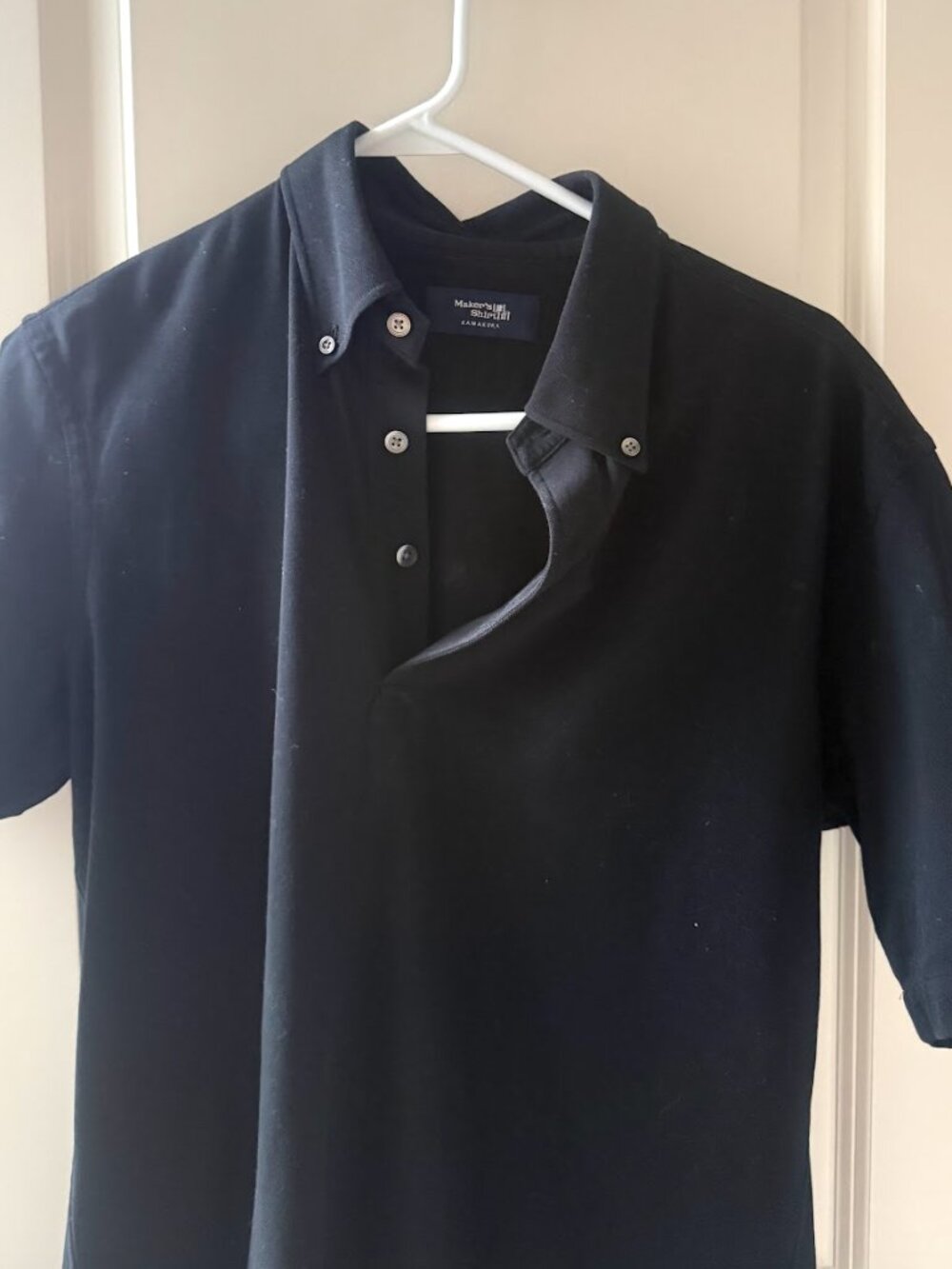 Makers black polo shirt